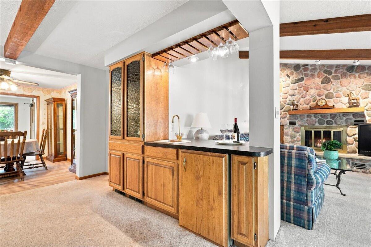 N7295 Ridge Road Plymouth, WI 53073 - Photo 14 of 70 Wet bar separates living rm from kitchen