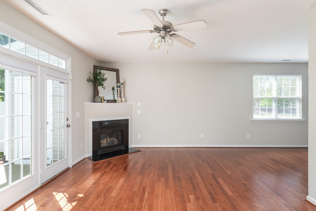 8212 Belneath Court Raleigh, NC 27613 - Photo 3 of 9 Cozy up with a GAS FIREPLACE in large Family Room. Family Room