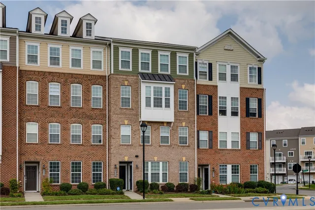a front view of a building with yard