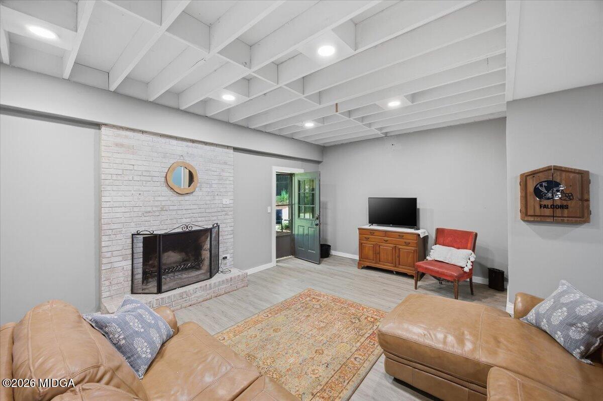 1608 Rumble Road Forsyth, GA 31029 - Photo 31 of 46 a bedroom with furniture and a fireplace