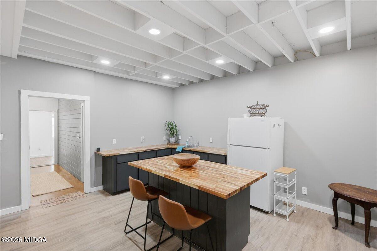 1608 Rumble Road Forsyth, GA 31029 - Photo 32 of 46 a kitchen that has a table and chairs in it