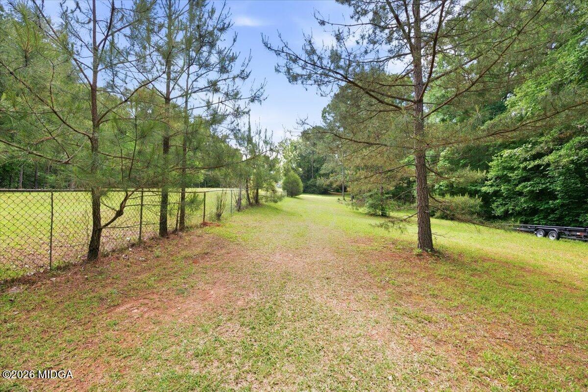 1608 Rumble Road Forsyth, GA 31029 - Photo 43 of 46 a view of backyard with tree