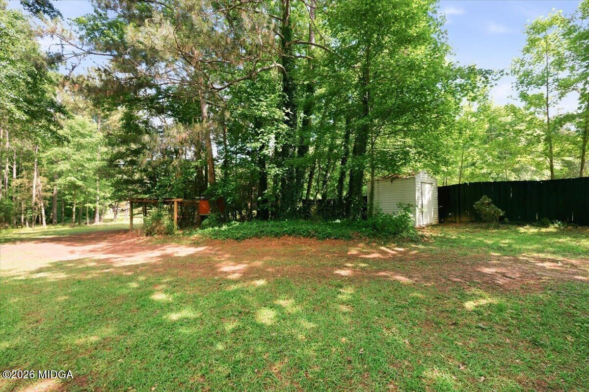 1608 Rumble Road Forsyth, GA 31029 - Photo 44 of 46 a view of a yard with a tree