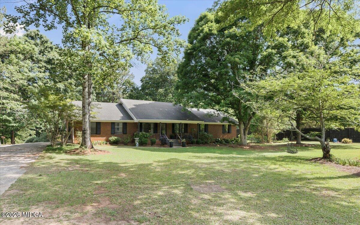 1608 Rumble Road Forsyth, GA 31029 - Photo 46 of 46 a view of a house with a yard