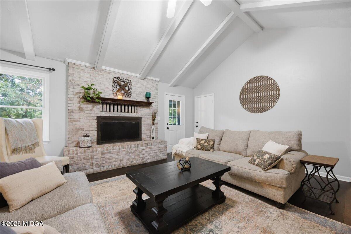 1608 Rumble Road Forsyth, GA 31029 - Photo 7 of 46 a living room with furniture and a fireplace