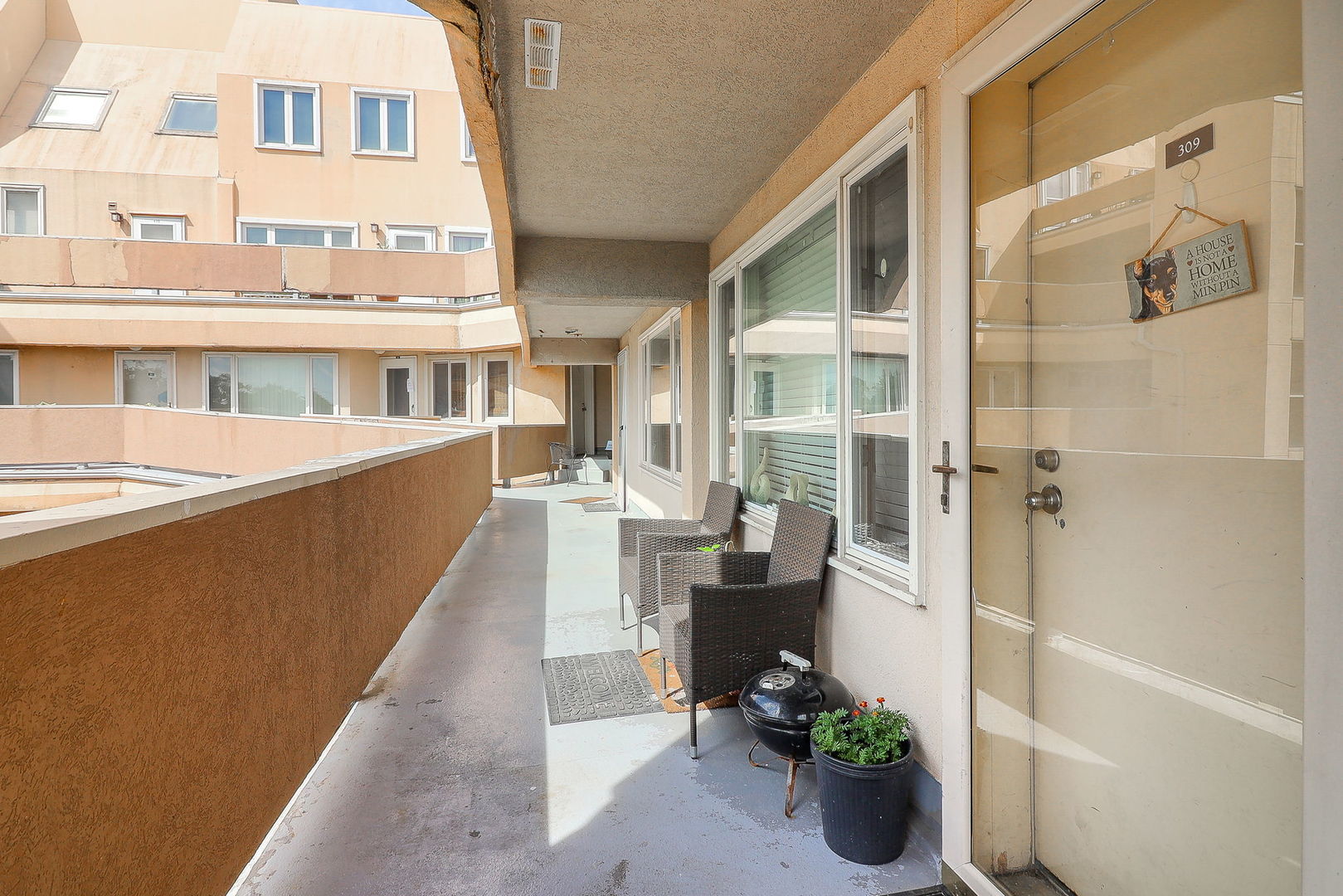 6337 Roosevelt Road, Unit 309 Berwyn, IL 60402 - Photo 13 of 16 a view of a house with backyard and sitting area