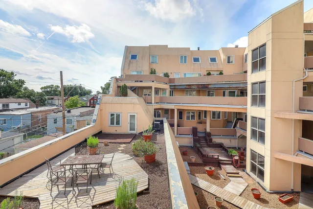 a view of a building from a balcony