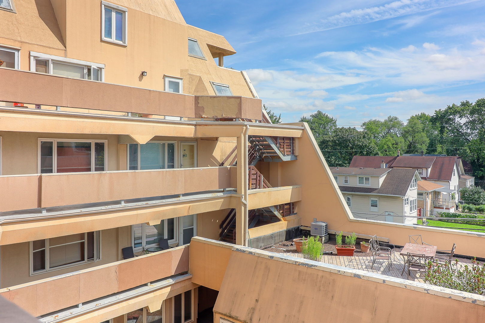 6337 Roosevelt Road, Unit 309 Berwyn, IL 60402 - Photo 15 of 16 a view of a tall building with large windows