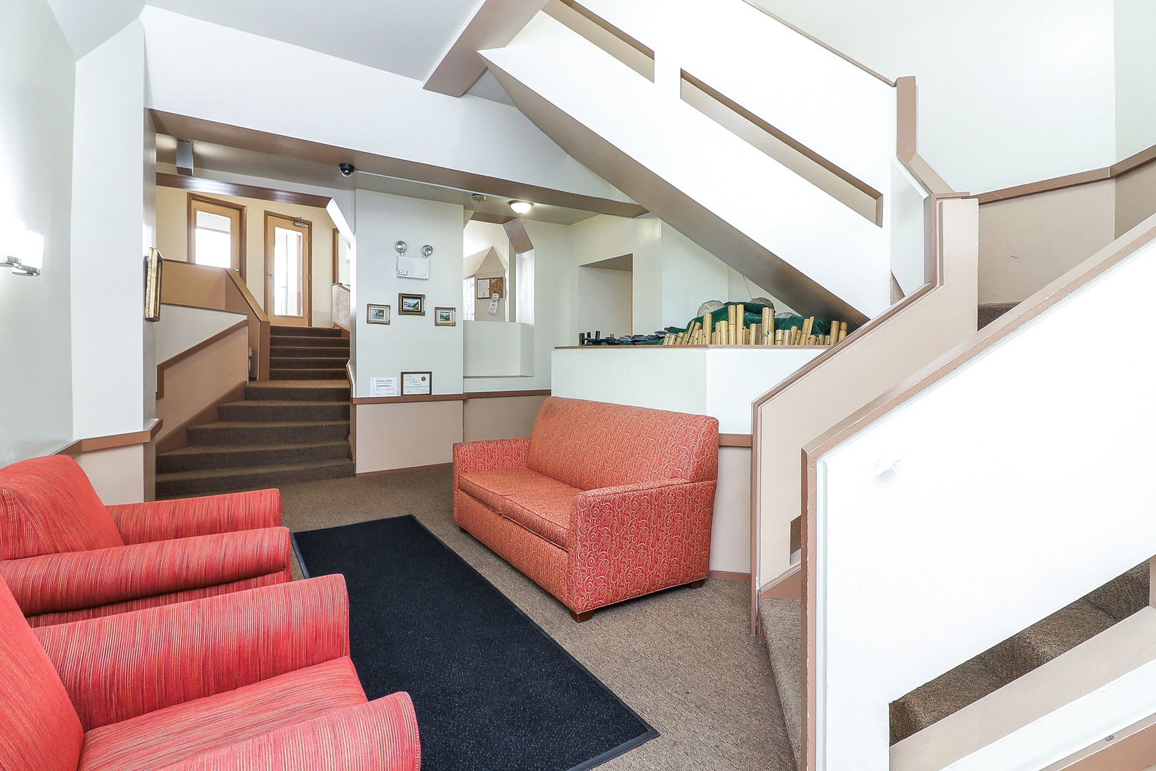 6337 Roosevelt Road, Unit 309 Berwyn, IL 60402 - Photo 8 of 16 a living room with furniture and a ceiling fan