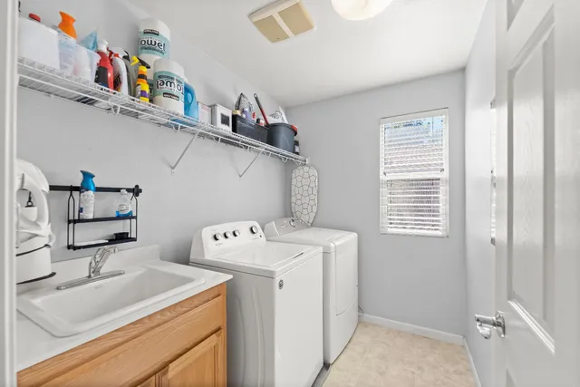 a view of a big room with windows and cabinet