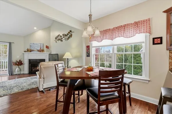 a kitchen with stainless steel appliances kitchen island granite countertop a sink and cabinets