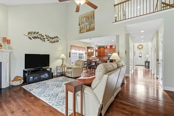 a bathroom with a sink mirror and toilet