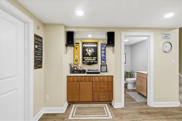 a bathroom with a sink toilet and vanity