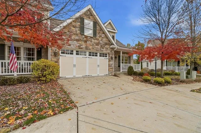 a front view of a house with a glass door