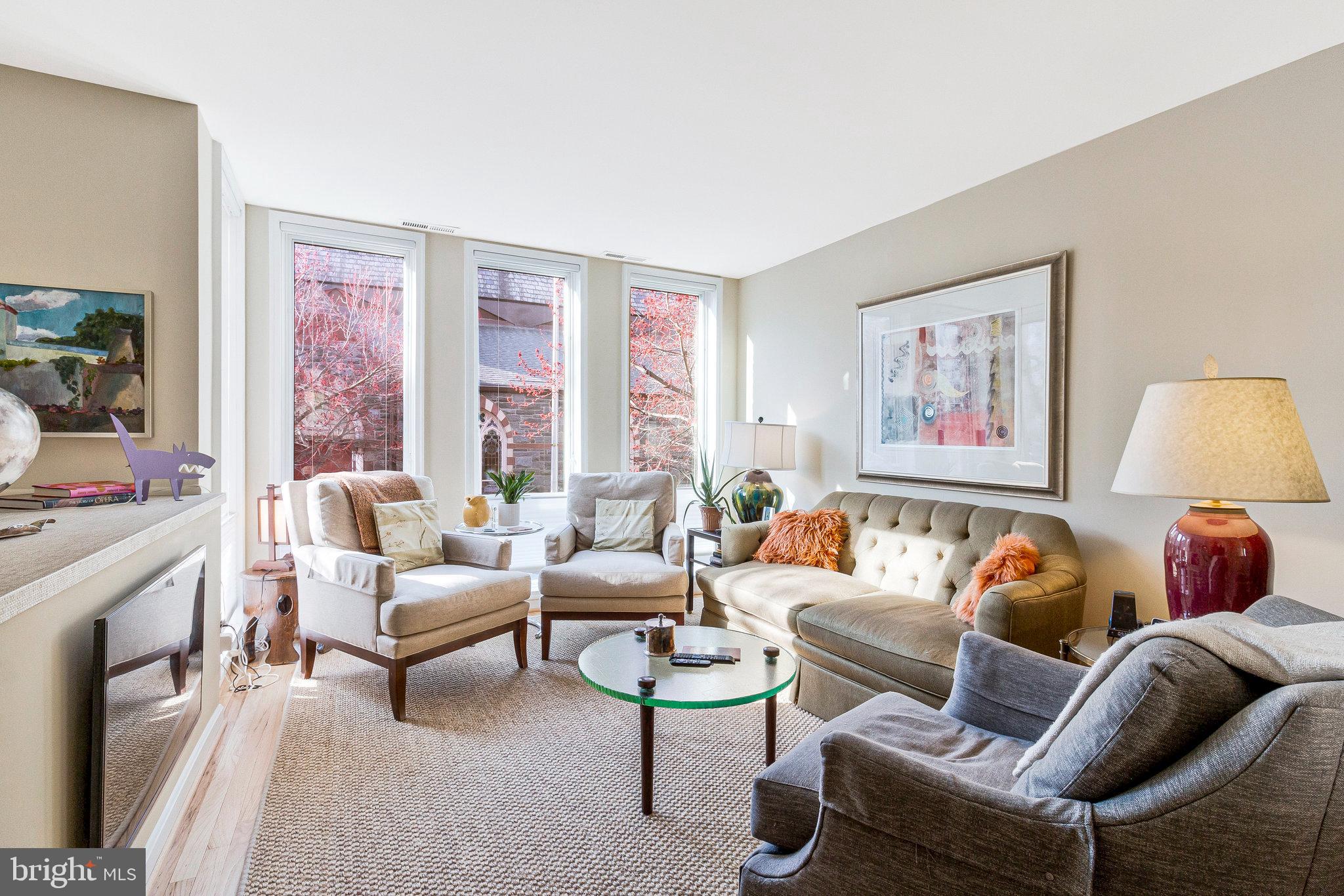 1501 Church Street Northwest Washington, DC 20005 - Photo 11 of 51 a living room with furniture and a lamp