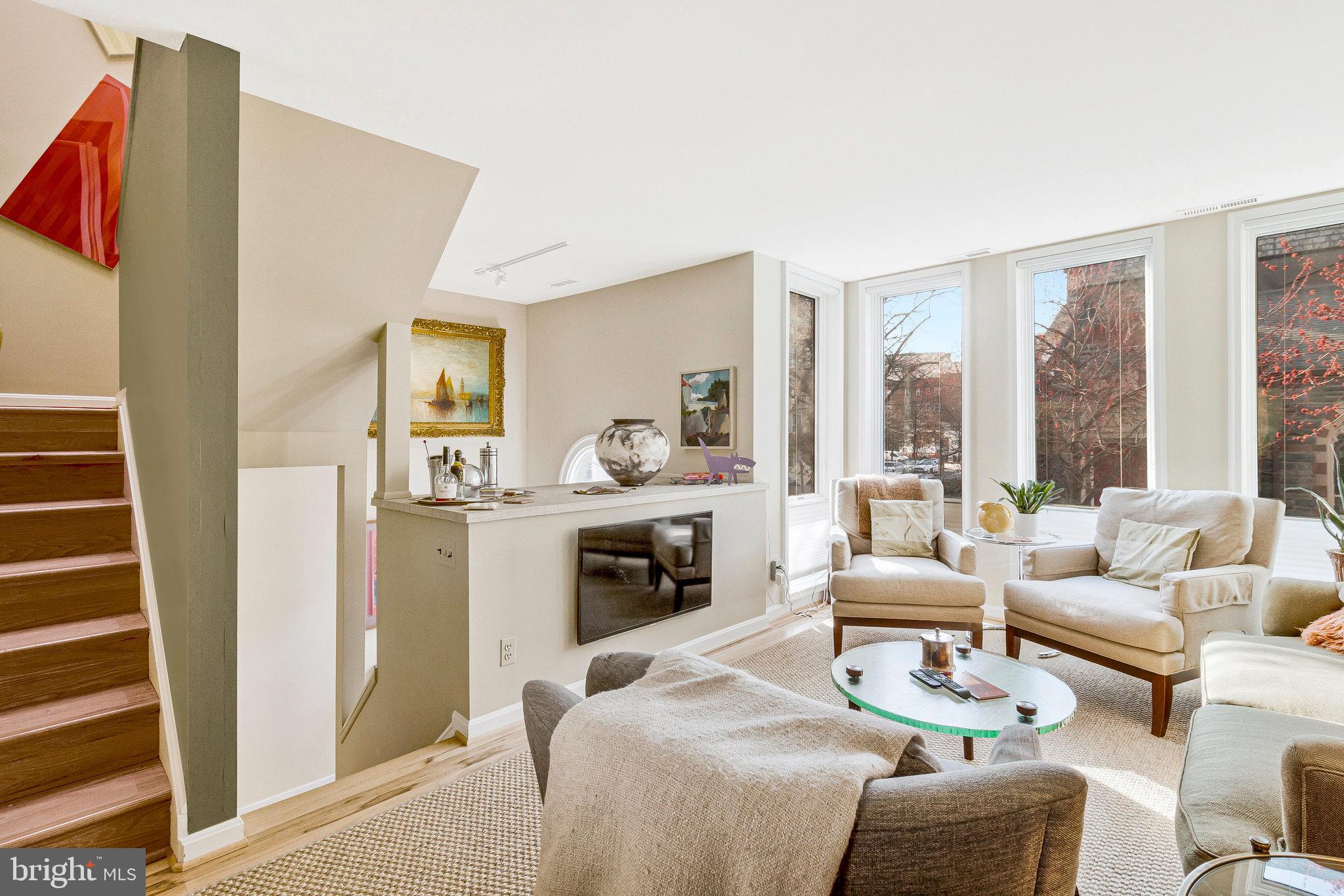 1501 Church Street Northwest Washington, DC 20005 - Photo 12 of 51 a living room with furniture fireplace and flat screen tv