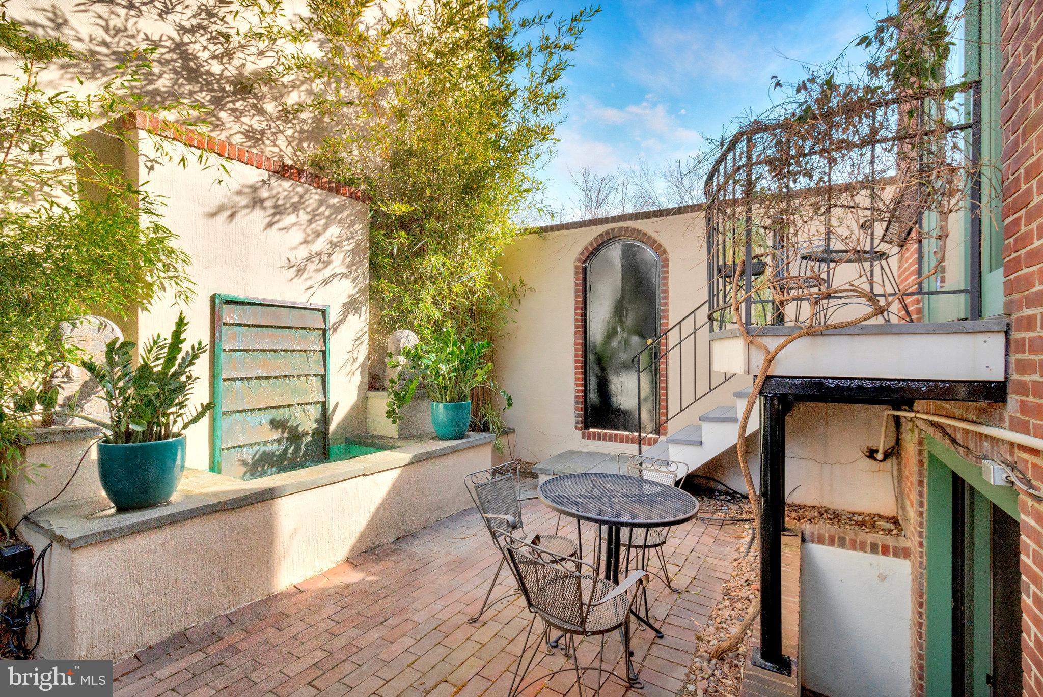 1501 Church Street Northwest Washington, DC 20005 - Photo 32 of 51 a view of a chair and table in the backyard