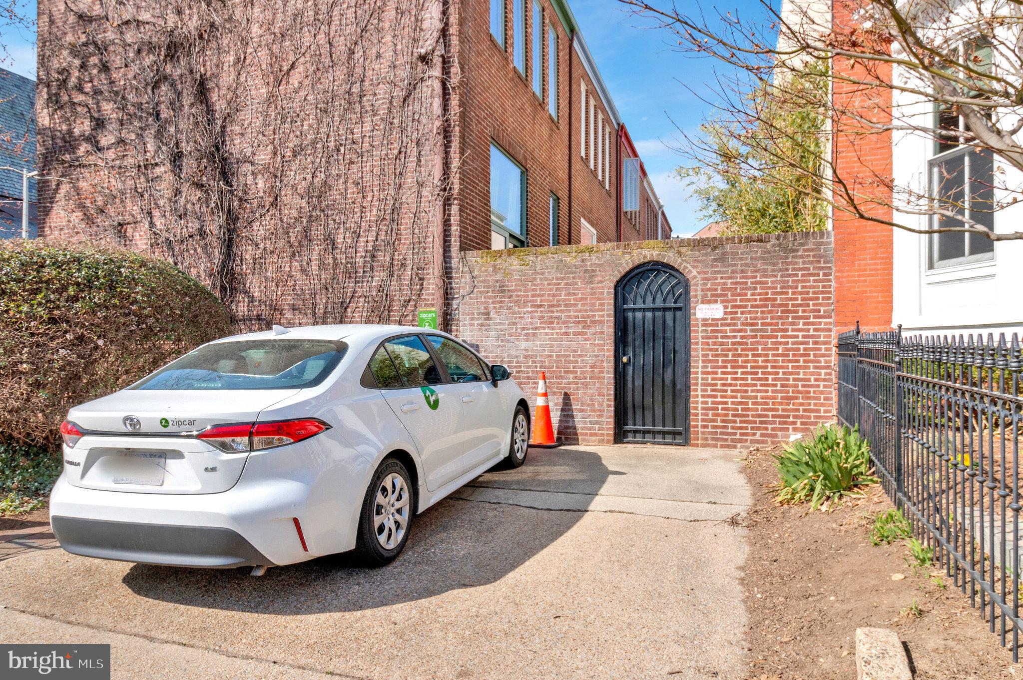 1501 Church Street Northwest Washington, DC 20005 - Photo 45 of 51 a car parked in front of a building