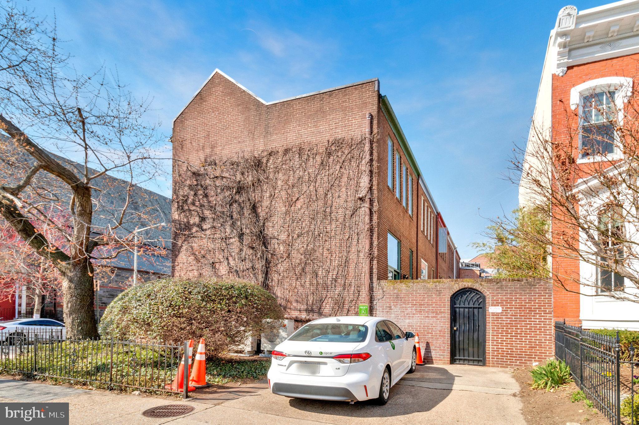 1501 Church Street Northwest Washington, DC 20005 - Photo 46 of 51 a car parked in front of a building