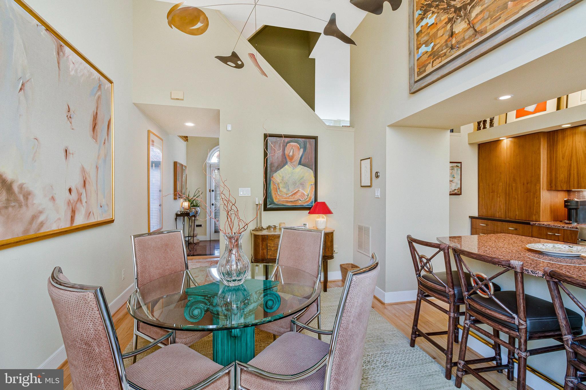 1501 Church Street Northwest Washington, DC 20005 - Photo 6 of 51 a view of a dining room with furniture and wooden floor