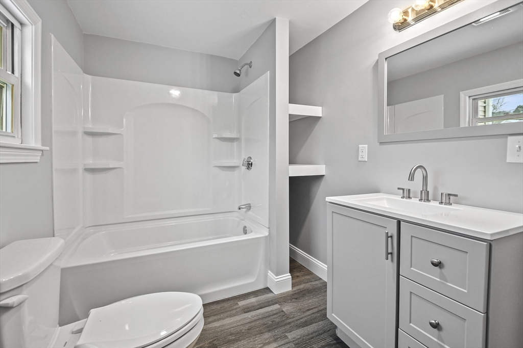509 High Street Clinton, MA 01510 - Photo 22 of 42 a bathroom with a sink toilet and shower