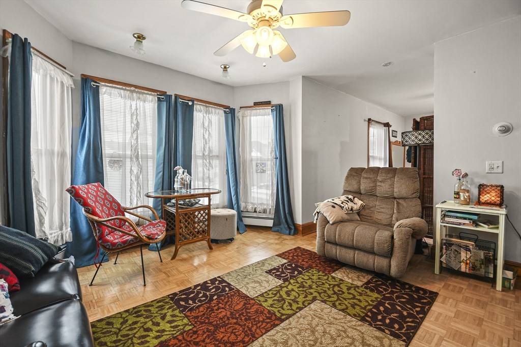 509 High Street Clinton, MA 01510 - Photo 24 of 42 a living room with furniture and a large window