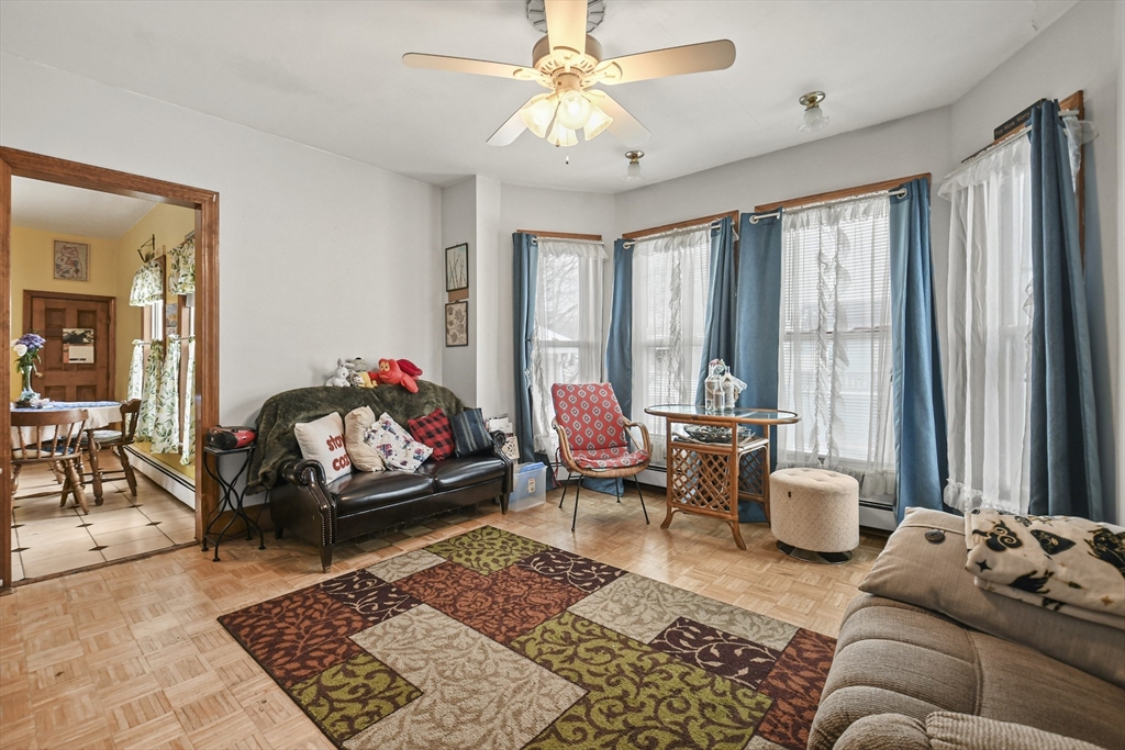 509 High Street Clinton, MA 01510 - Photo 25 of 42 a living room with furniture and a large window