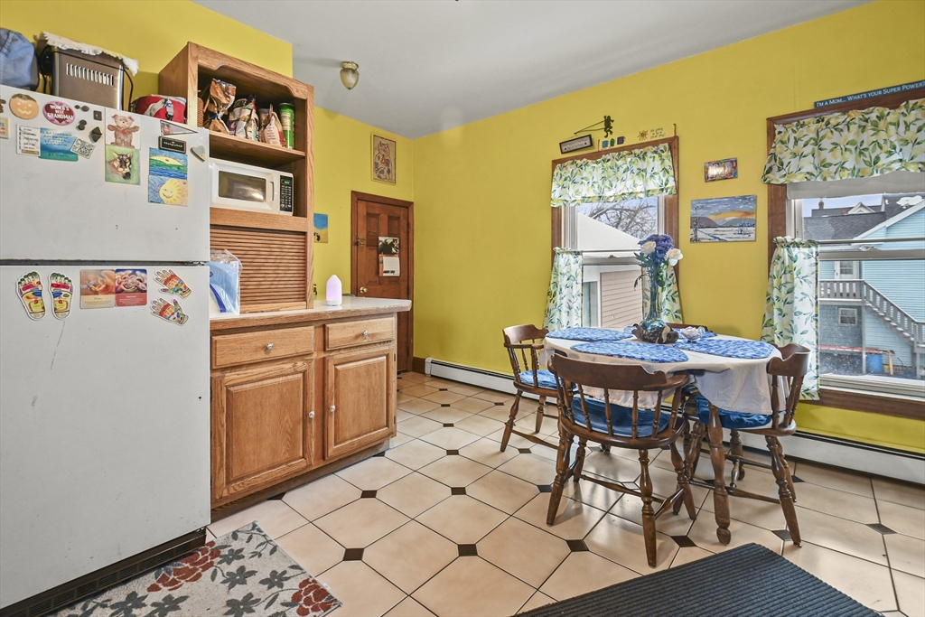 509 High Street Clinton, MA 01510 - Photo 27 of 42 a dining room with furniture and window