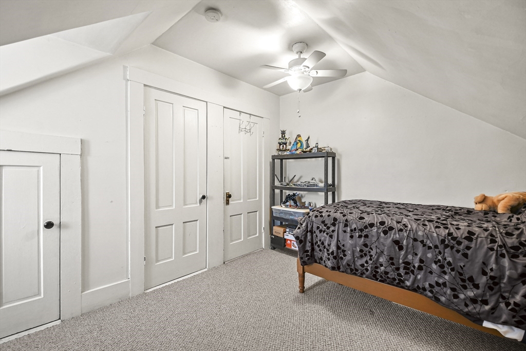 509 High Street Clinton, MA 01510 - Photo 35 of 42 a bedroom with bed and window