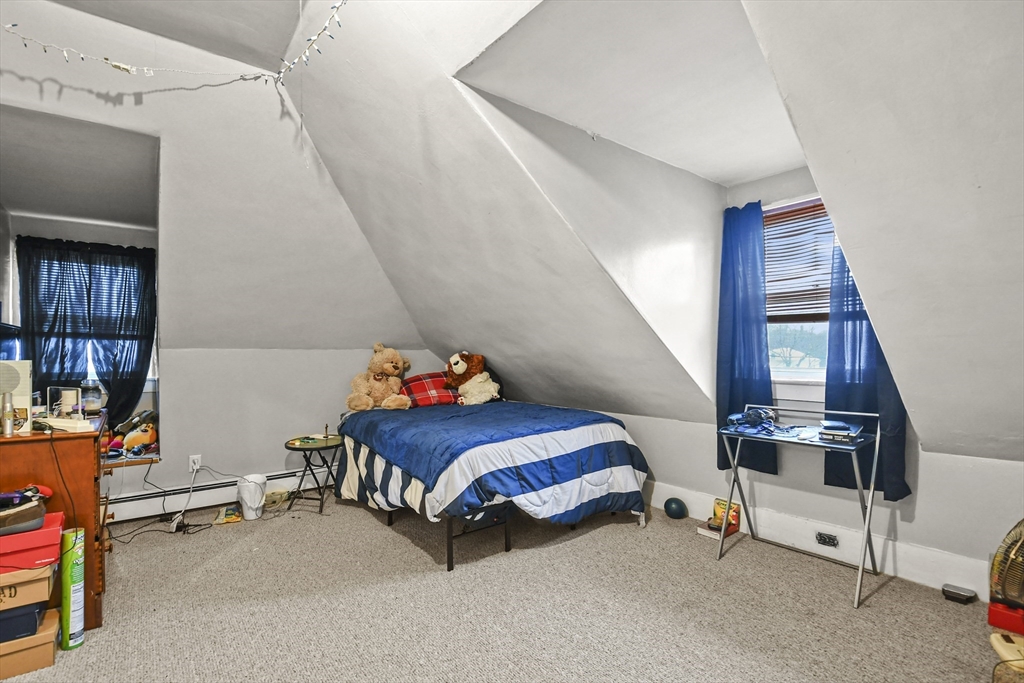 509 High Street Clinton, MA 01510 - Photo 37 of 42 a room with stairs and toys