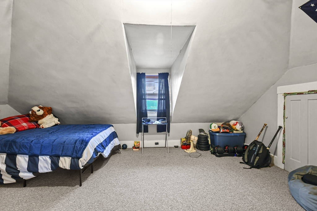 509 High Street Clinton, MA 01510 - Photo 38 of 42 a bedroom with furniture and a window