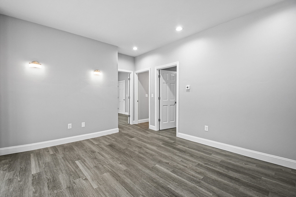509 High Street Clinton, MA 01510 - Photo 4 of 42 a view of an empty room with wooden floor