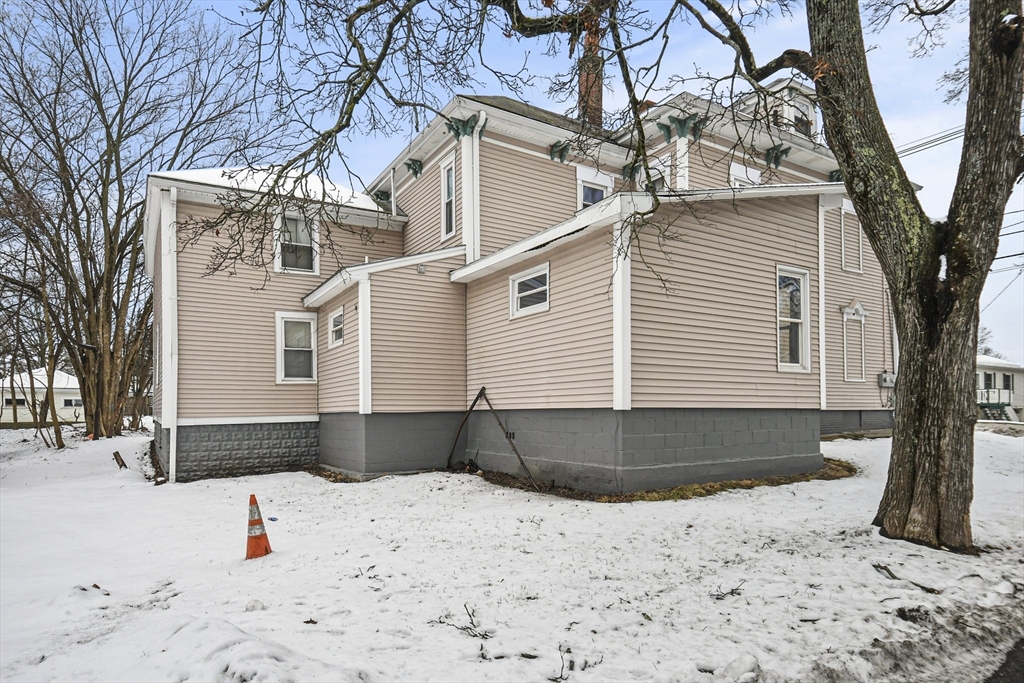 509 High Street Clinton, MA 01510 - Photo 41 of 42 a front view of a house with a yard