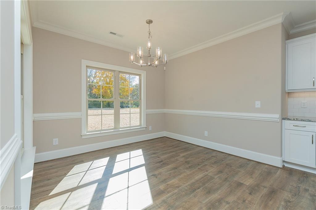 8448 Fairgrove Church Road Browns Summit, NC 27214 - Photo 17 of 48 Breakfast Room2