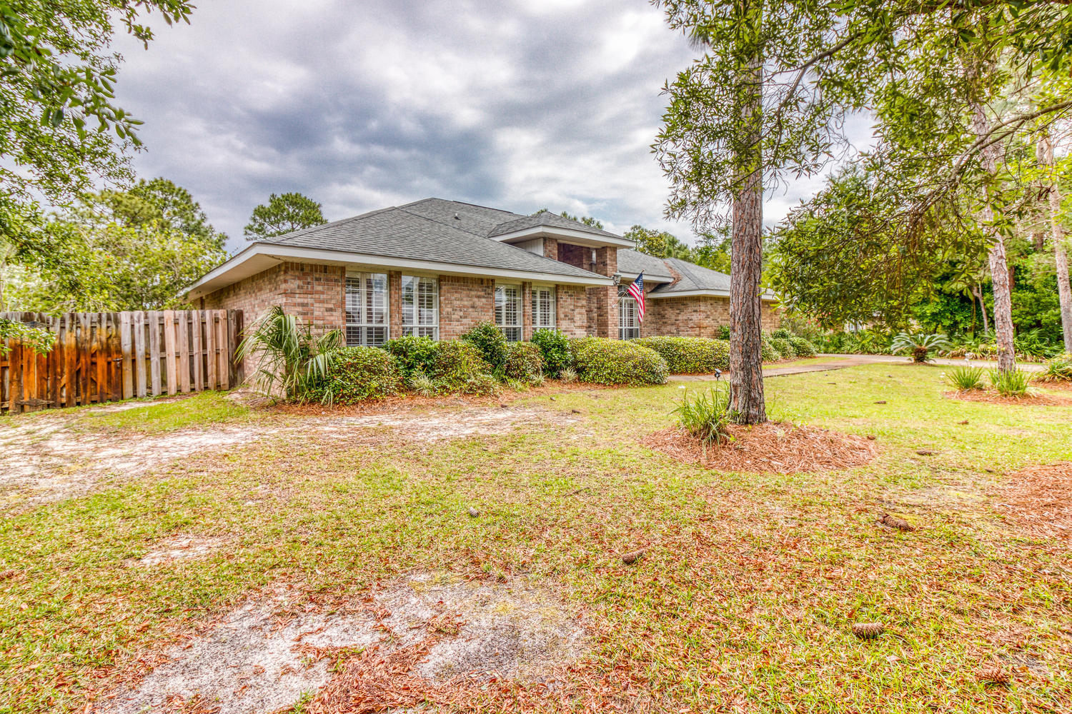 17 Buck Road Santa Rosa Beach, FL 32459 - Photo 3 of 41 a front view of house with yard and green space