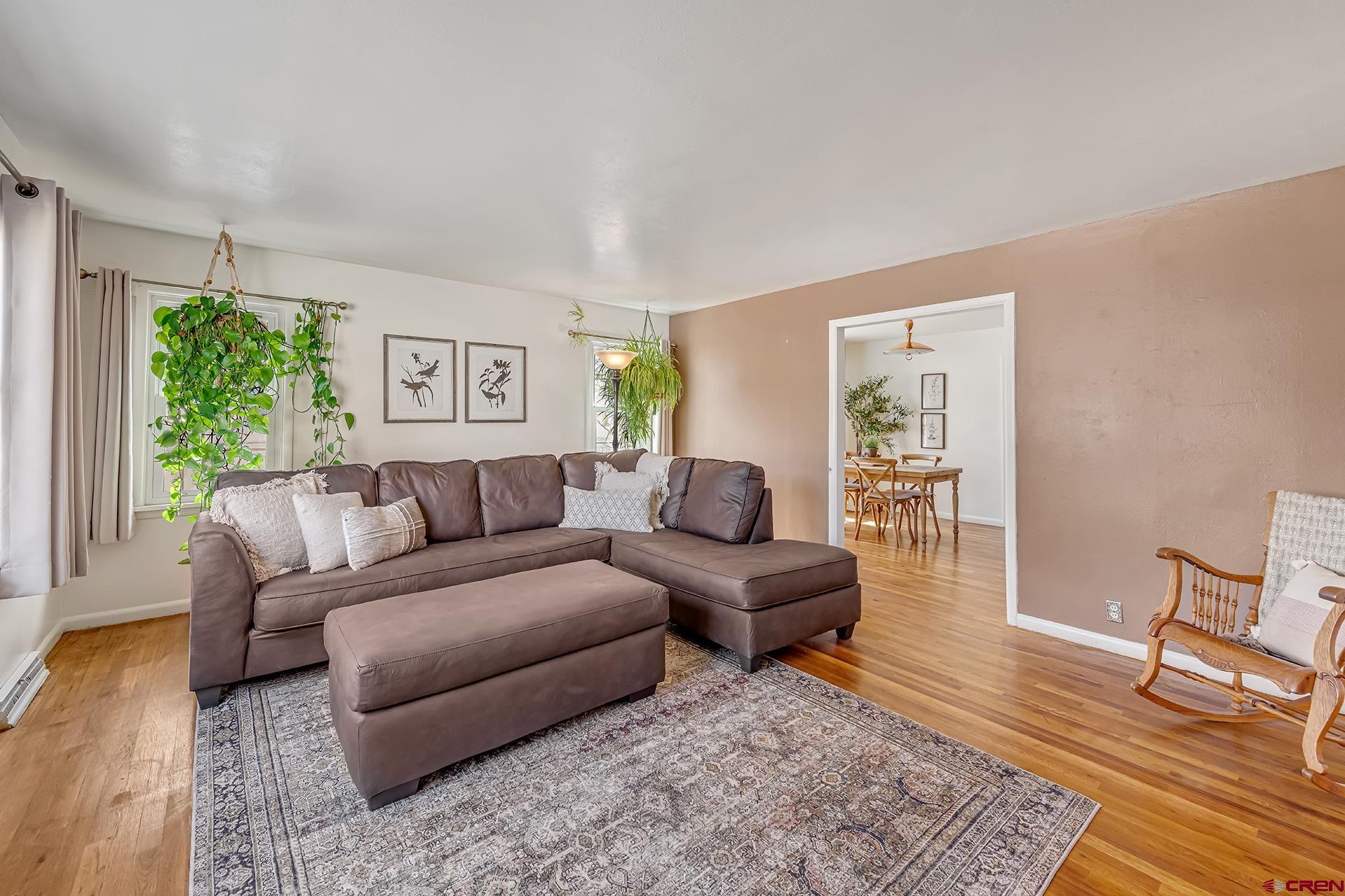 735 Howard Street Delta, CO 81416 - Photo 7 of 34 a living room with furniture and a rug