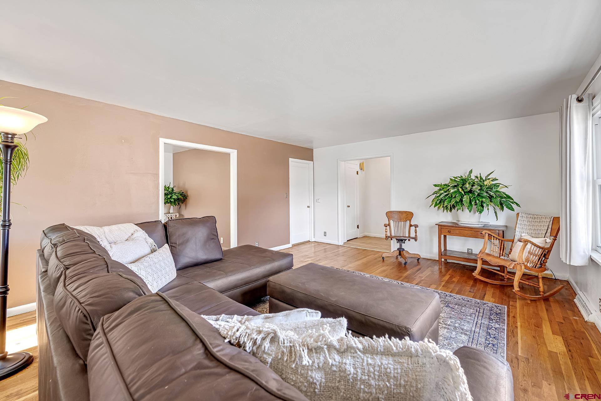 735 Howard Street Delta, CO 81416 - Photo 9 of 34 a living room with furniture and a couch