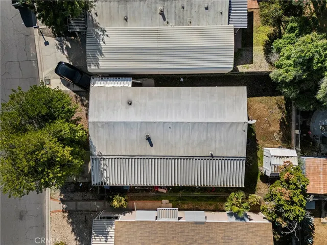 a small yard with wooden fence