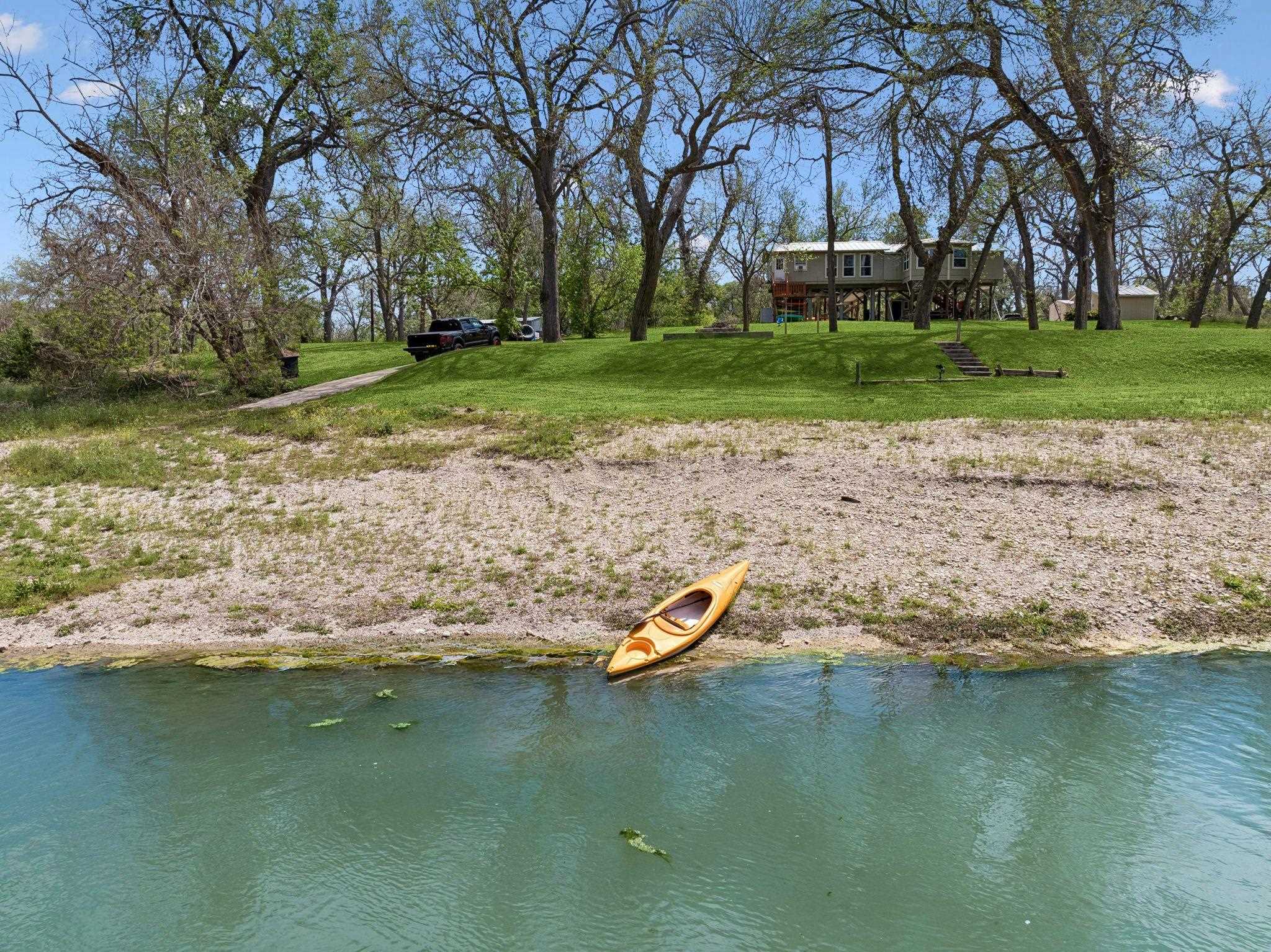 a view of a lake with a park