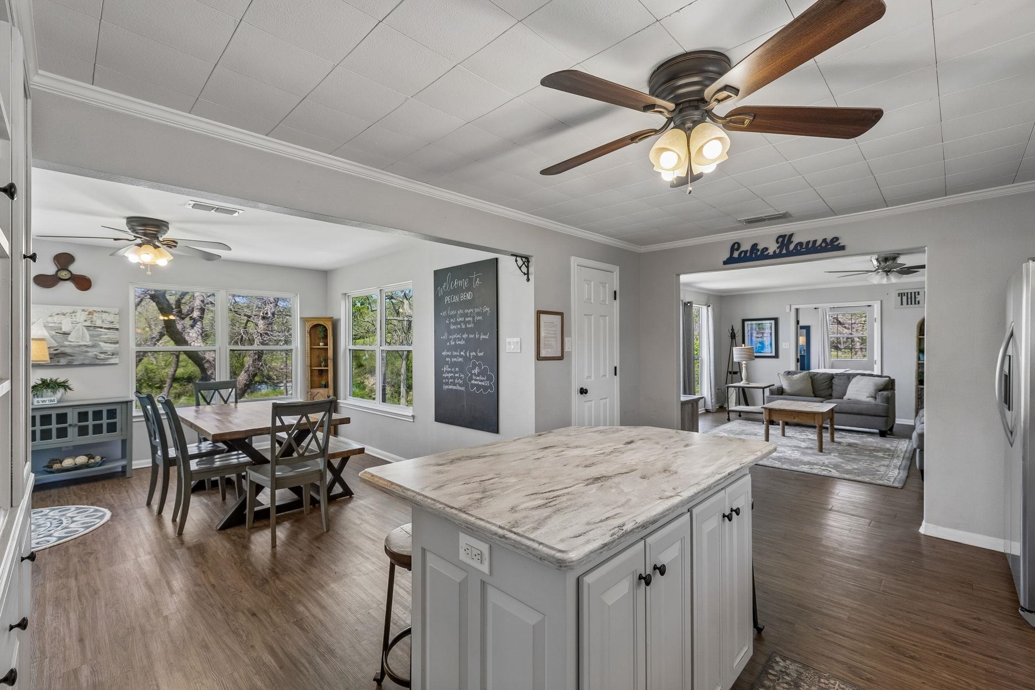 146 Antelope Lane Seguin, TX 78155 - Photo 15 of 28 a view of a dining room with furniture window and wooden floor