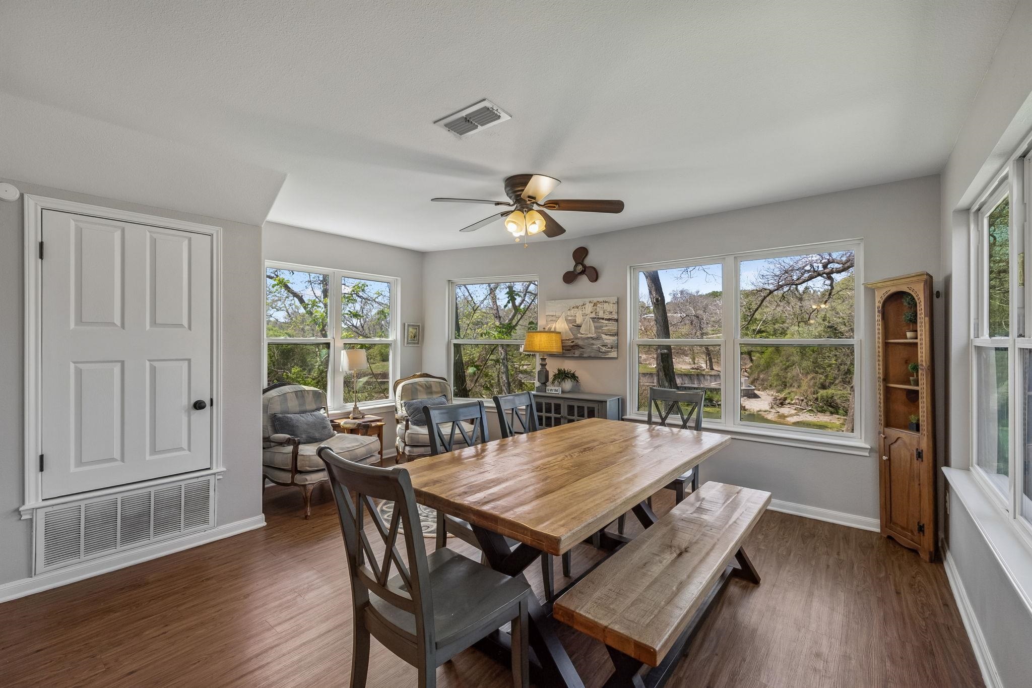 146 Antelope Lane Seguin, TX 78155 - Photo 16 of 28 a view of a dining room with furniture window and wooden floor