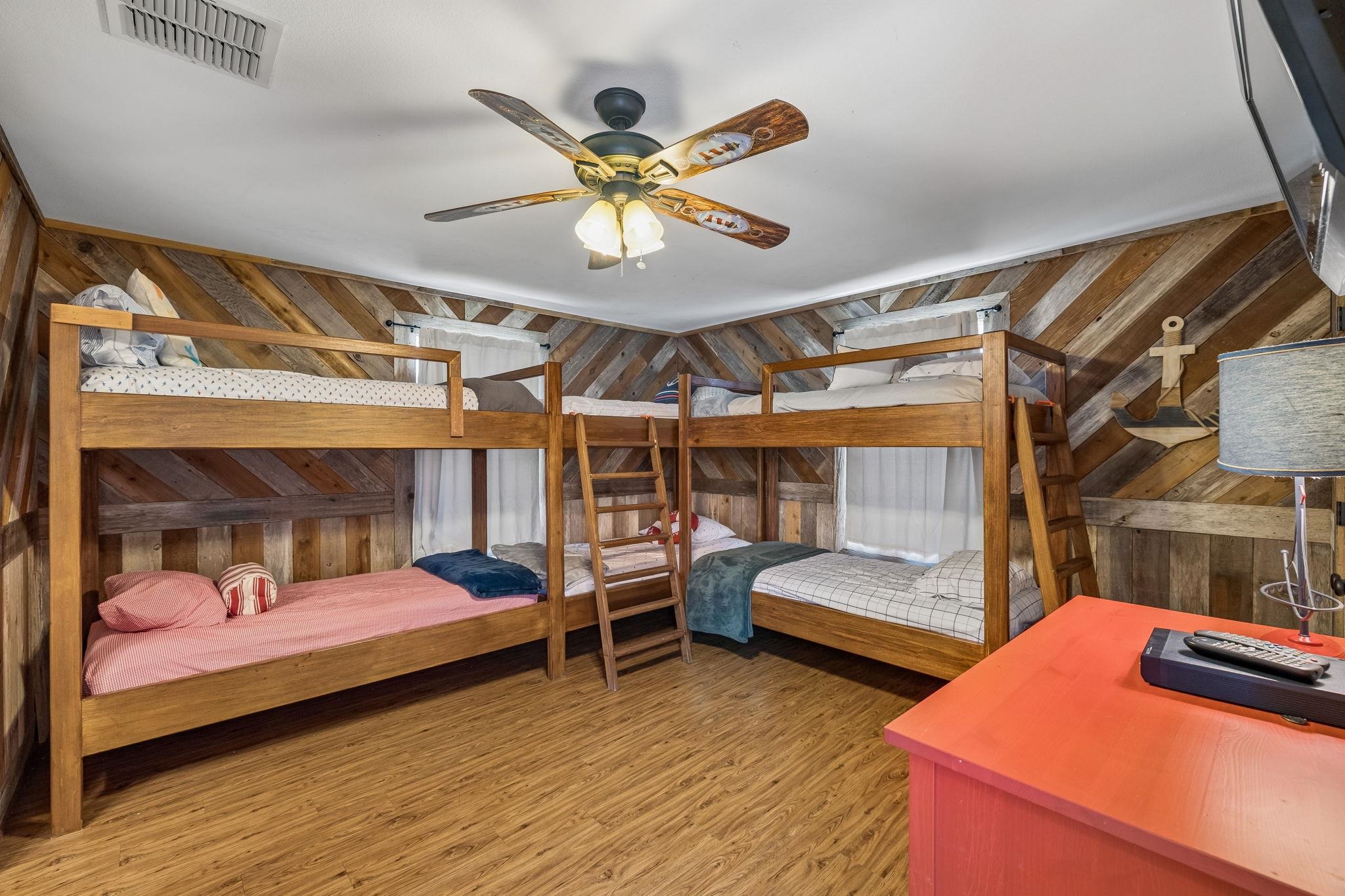 146 Antelope Lane Seguin, TX 78155 - Photo 23 of 28 a bedroom with two beds and a ceiling fan