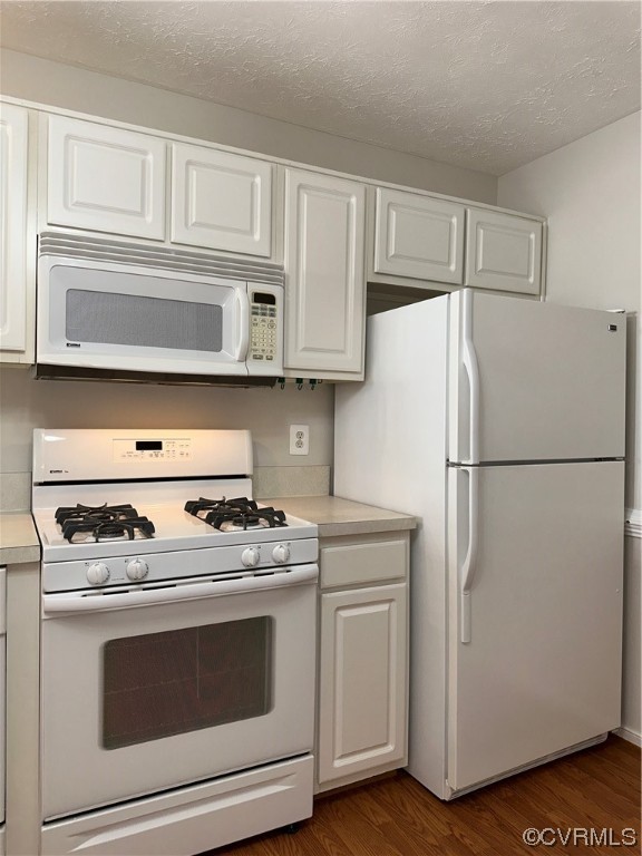 1419 Tannery Circle Midlothian, VA 23113 - Photo 18 of 43 a kitchen with stainless steel appliances white cabinets and a refrigerator