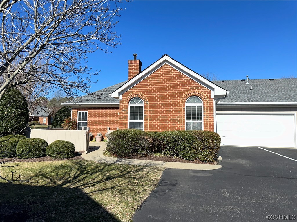 1419 Tannery Circle Midlothian, VA 23113 - Photo 2 of 43 a front view of a house with a yard
