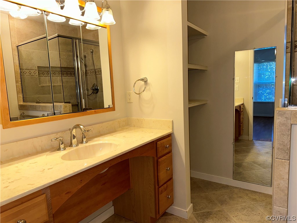 1419 Tannery Circle Midlothian, VA 23113 - Photo 23 of 43 a bathroom with a sink and a mirror