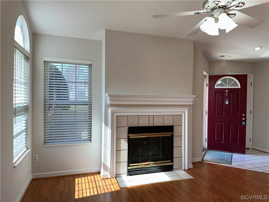 1419 Tannery Circle Midlothian, VA 23113 - Photo 9 of 43 a view of a livingroom with a fireplace and window
