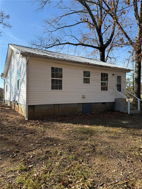 343 Chastain Mill Road Dawsonville, GA 30534 - Photo 12 of 12 a view of house with backyard