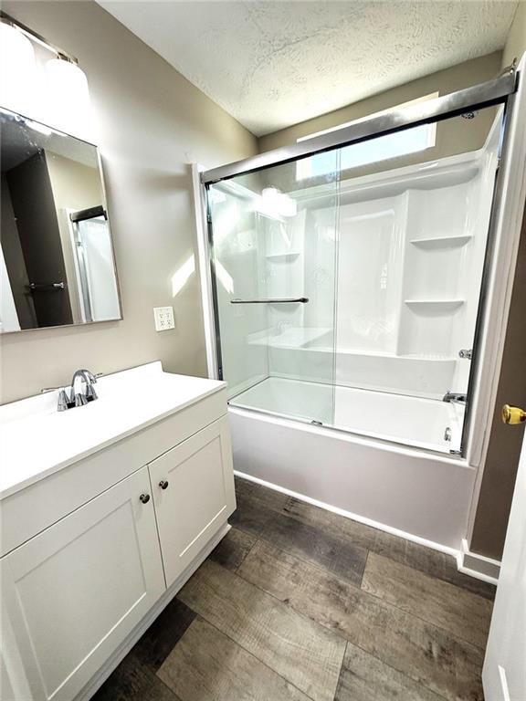 343 Chastain Mill Road Dawsonville, GA 30534 - Photo 9 of 12 a bathroom with a double vanity sink mirror and a bathtub