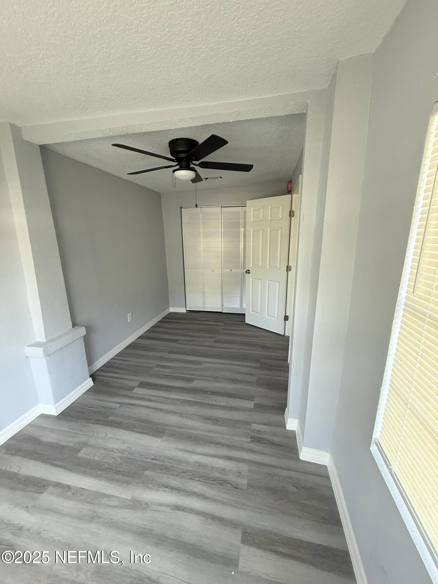 830 Rushing Street Jacksonville, FL 32209 - Photo 4 of 6 a view of an empty room with a window