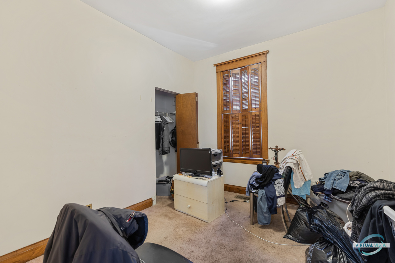 1521 North Springfield Avenue Chicago, IL 60651 - Photo 14 of 40 a room with a couch and a window